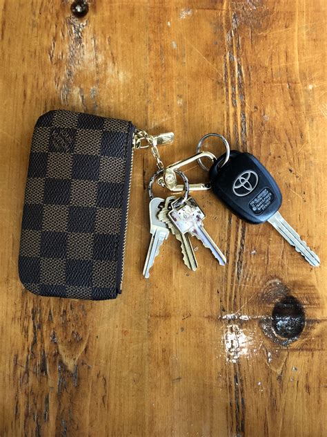 how to open louis vuitton key chain|Louis Vuitton keychain wallet.